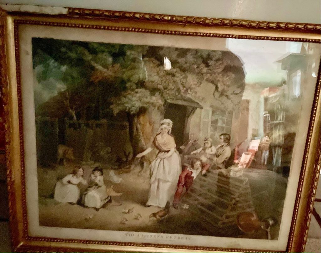 Framed artwork titled 'The Citizens' Refuge' depicting a scene with several figures in a garden setting.