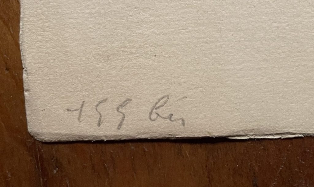 A close-up of a handwritten note with the text '455 Ben' on a piece of paper.
