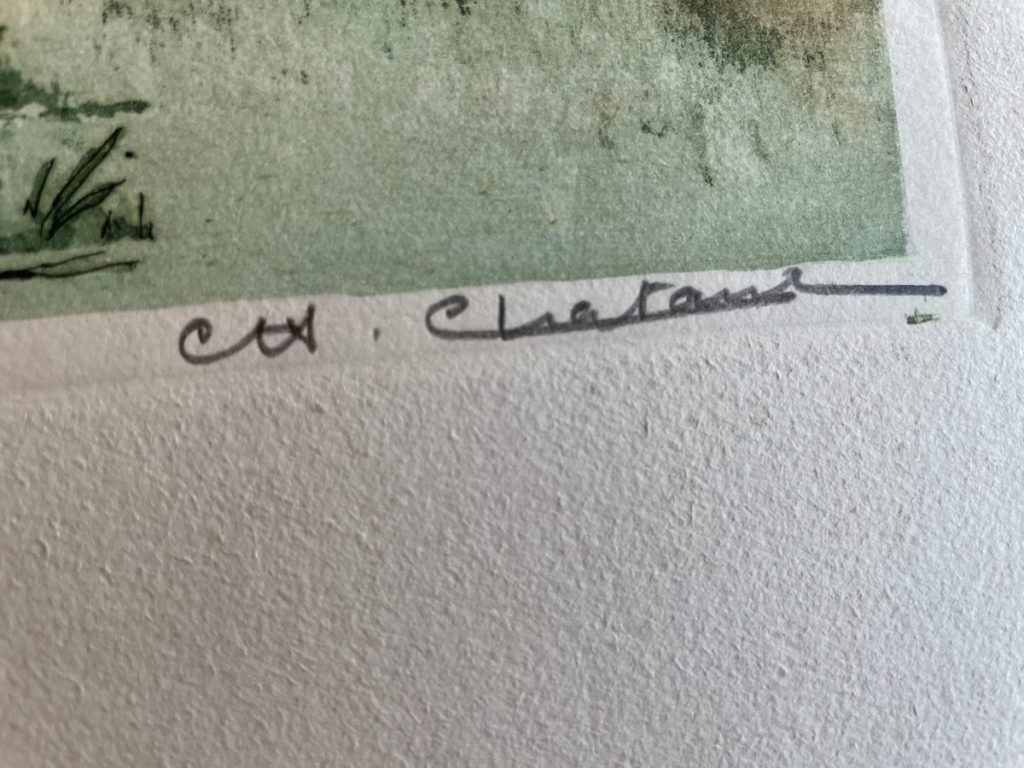 Close-up of a signature on an artwork, written in cursive with the initials 'C.H.'